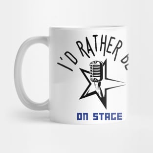 I´d rather be on music stage, microphone. Black text and image. Mug